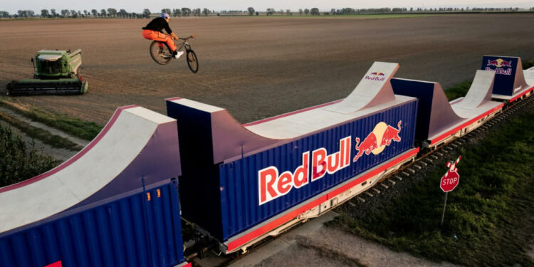 Red Bull — World First Bike Flip On A Moving Train By Dawid Godziek