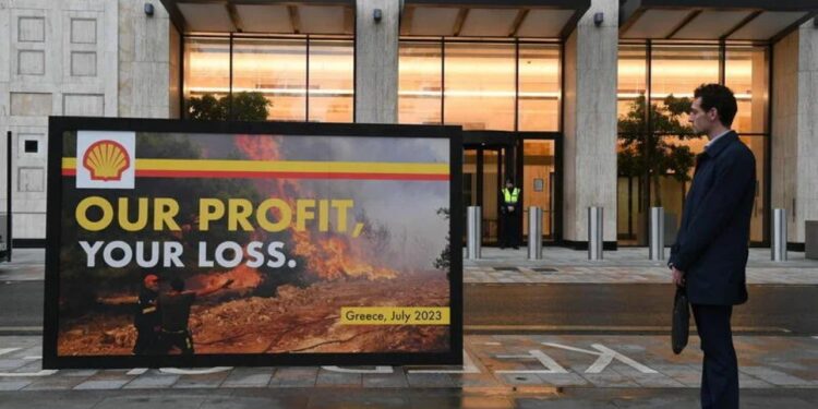 Greenpeace — Our Profit, Your Loss By Chris J. Ratcliffe