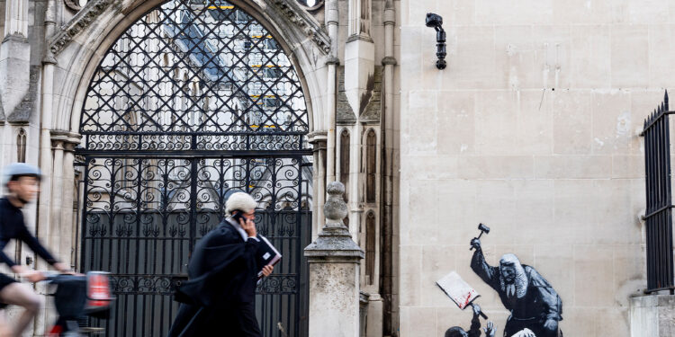 Mural at The Royal Courts of Justice By Banksy